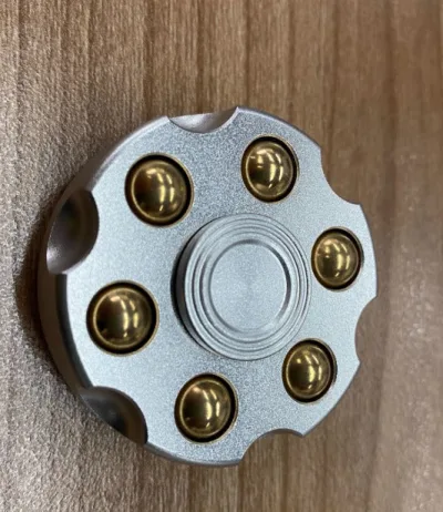 Spinner-fidget med roterende cylinder i metallegering